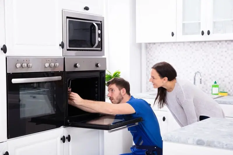 ElectriciansOnCall electrician installing new appliance in Margate